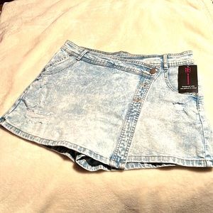 Blue Jean skirt with front flap and three buttons.  Never worn